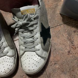 SL and Golden Goose sneakers